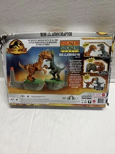 Mattel Games - Jurassic World Dominion Blue Vs. Atrociraptor Rock 'Em Sock 'Em - Picture 1 of 8