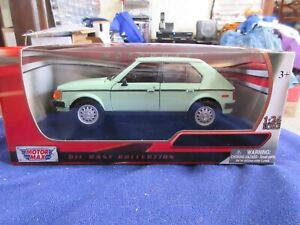 MotorMax 1:24 1985 Plymouth Horizon Mint Green Diecast Collection
