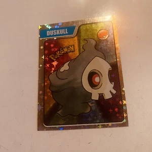 Pegatina holográfica 2024 - Duskull - #182 - Última evolución Pokémon - Imagen 1 de 2