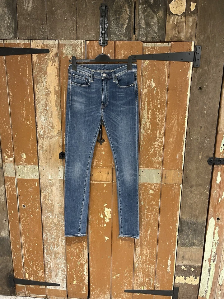 Pantalones de mezclilla Levi's 519 azul mezcla de algodón elástico cremallera logotipo informal para todos los días W33 L34 Foto 1 de 4