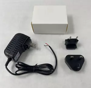 Adaptador de CA/CC sin marca BX18W-1201000 12V 1A con adaptadores de enchufe de pared internacionales - Imagen 1 de 19
