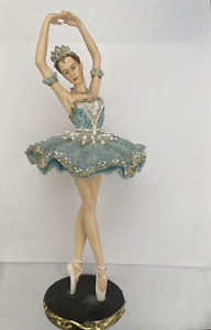 Ballerina on her toes blue tutu figurine statue resin