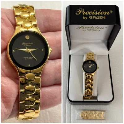 Женские кварцевые часы Precision от GRUEN с подлинными бриллиантами 26 мм золотистый черный циферблат - Изображение 1 из 4