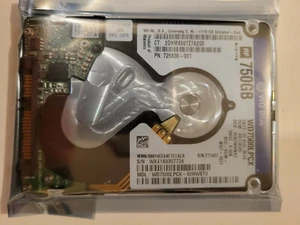 WD WD7500LPCX-60HWST0 750GB 2.5" HD DCM: HBTJBH0 WD7500LPCX PN: 726830-001 - Picture 1 of 3