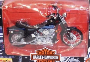 1:18 MAISTO HARLEY DAVIDSON 1997 FXSTSB BAD BOY BLACK BLUE SERIES 1 NIB - Picture 1 of 7