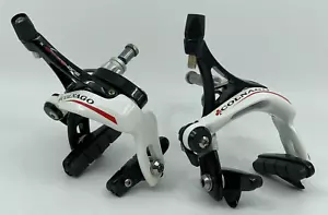 JUEGO DE PINZAS DE FRENO DELANTERAS Y TRASERAS COLNAGO X-Brake One negras blancas nuevo embalaje original - Imagen 1 de 5