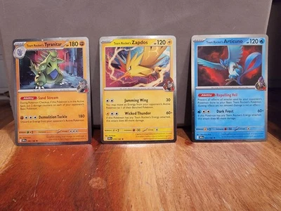 Pokémon TCG Team Rocket’s Zapdos, Articuno, Tyranitar Cosmo Holo Promos - Image 1 of 2