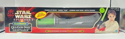 Sable de luz electrónico Hasbro Star Wars Episodio 1 Qui-Gonn Jinn 1999 NUEVO SELLADO Foto 1 de 4