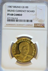 Brunei SULTAN HASSANAL BOLKIAH 1987 Currency Board 100 Dollars Gold Coin NGC 68 - Picture 1 of 4