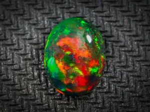 Opale nero etiope naturale 3,83 ct ovale cabochon pietra preziosa sfusa 12,3 x 9,5 x 6,5 mm - Foto 1 di 3