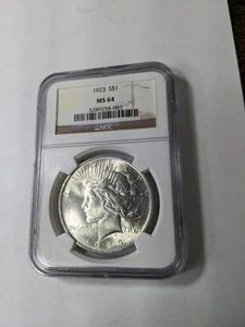 1923 Peace Dollar CERTIFIED NGC MS 64 Silver Dollar - Picture 1 of 4