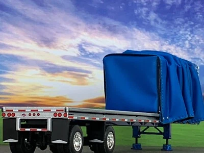 1/64 DCP BLUE UTILITY 53' CURTAIN SIDE ROLL TARP TRAILER - Image 1 of 4