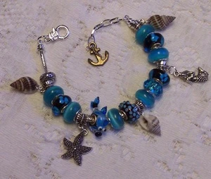 Pulsera inspirada en el mar del océano peces y conchas marinas de vidrio acuático - Imagen 1 de 3