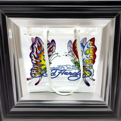 Bolso grande de hombro Ed Hardy MARIPOSA PÚRPURA transparente con bolsa nuevo con etiquetas precio de venta sugerido por el fabricante $159 Foto 1 de 4