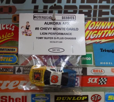 AURORA AFX, #8 CHEVY MONTE CARLO, RENDIMIENTO LEÓN, CHASIS SUPER G-PLUS, COCHE HO Foto 1 de 4