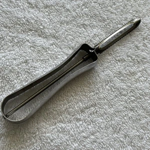 Vintage ECKO lama galleggiante acciaio inox lama seghettata pelapatate made USA - Foto 1 di 13