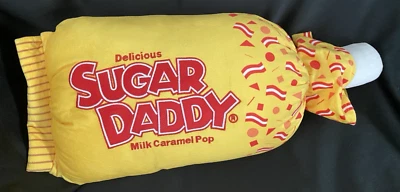 Sugar Daddy 牛奶焦糖流行毛绒枕头带隐藏保暖口袋 22 英寸长 — 第 1/4 张图片