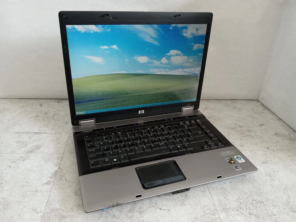 HP Compaq 6735b 15" Laptop AMD CPU 4GB RAM 120GB HDD Windows XP - READ -RR - Image 1 of 4