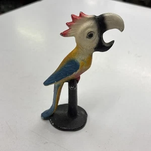 Abridor de tapa de botella temático loro de hierro fundido de la década de 1940 pájaro vintage barware retro - Imagen 1 de 18