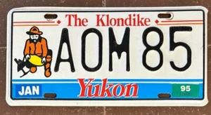 Yukon 1995 THE KLONDIKE MINER GRAPHIC License Plate # AOM 85 - Picture 1 of 1