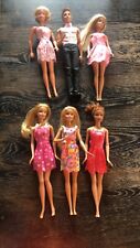 Mattel Barbie lot of 6 and 1 is a Ken doll comes with outfit