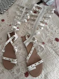 Scene By* "Zaylee" Size 9.5 White High Gladiator Sandals Faux Leather Gold Studs - Picture 1 of 8