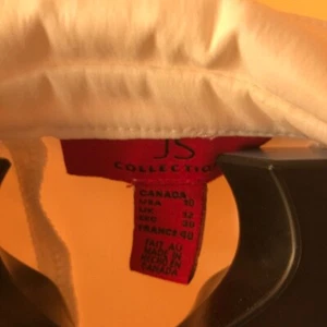JS Collection Zippered Trumpet Sleeve Blouse made in Canada - Picture 1 of 6