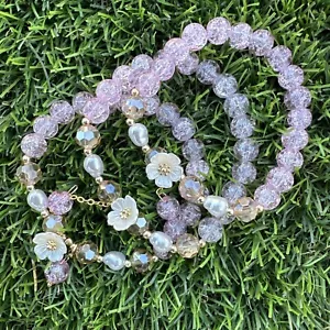 Pulsera de tres cristales con flor de margarita - Imagen 1 de 12