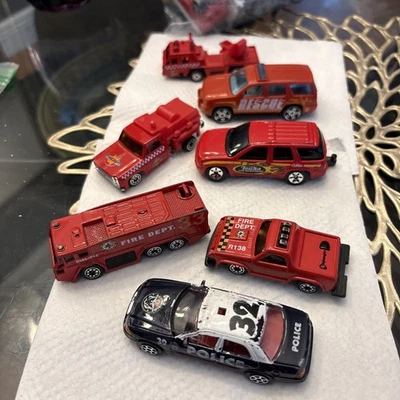 Lot of 7 Diecast Cars – Matchbox Fire Truck, Fire Dep, Fire Rescue,  Police - Image 1 of 3