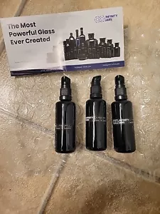 Set Of 3 Black Ultraviolet Glass Lotion Infinity Containers & Pumps NEW Empty - Picture 1 of 4