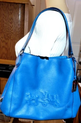 Bolso de hombro Coach Edi caballo y carro en relieve, azul turquesa. Foto 1 de 4