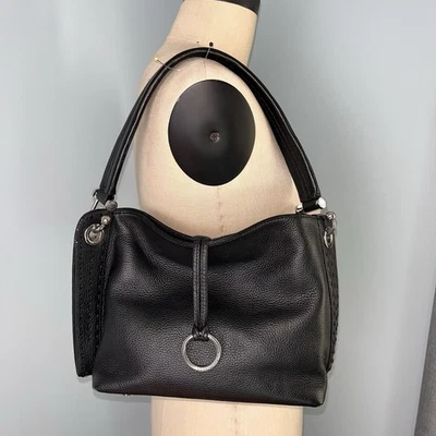 Authentic Black BCBG Max Azria Leather Baguette Hobo Silver Pierce Metal Handbag - Image 1 of 4