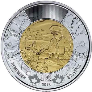 Monedas canadienses Toonie 2015 Remembrance in Flanders Fields en mano - Imagen 1 de 1
