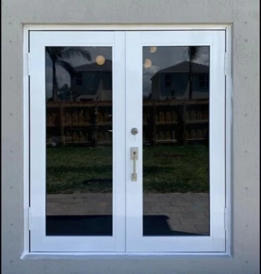 FRENCH IMPACT DOUBLE DOOR 72x80 OUTSWING. ALL HARDWARE INCLUDED. CAT 5 RESISTANT - Image 1 of 4