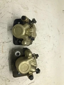 15J24 2014 POLARIS RZR 170 FRONT BRAKE CALIPER SET 0454381 0454380 - Picture 1 of 8