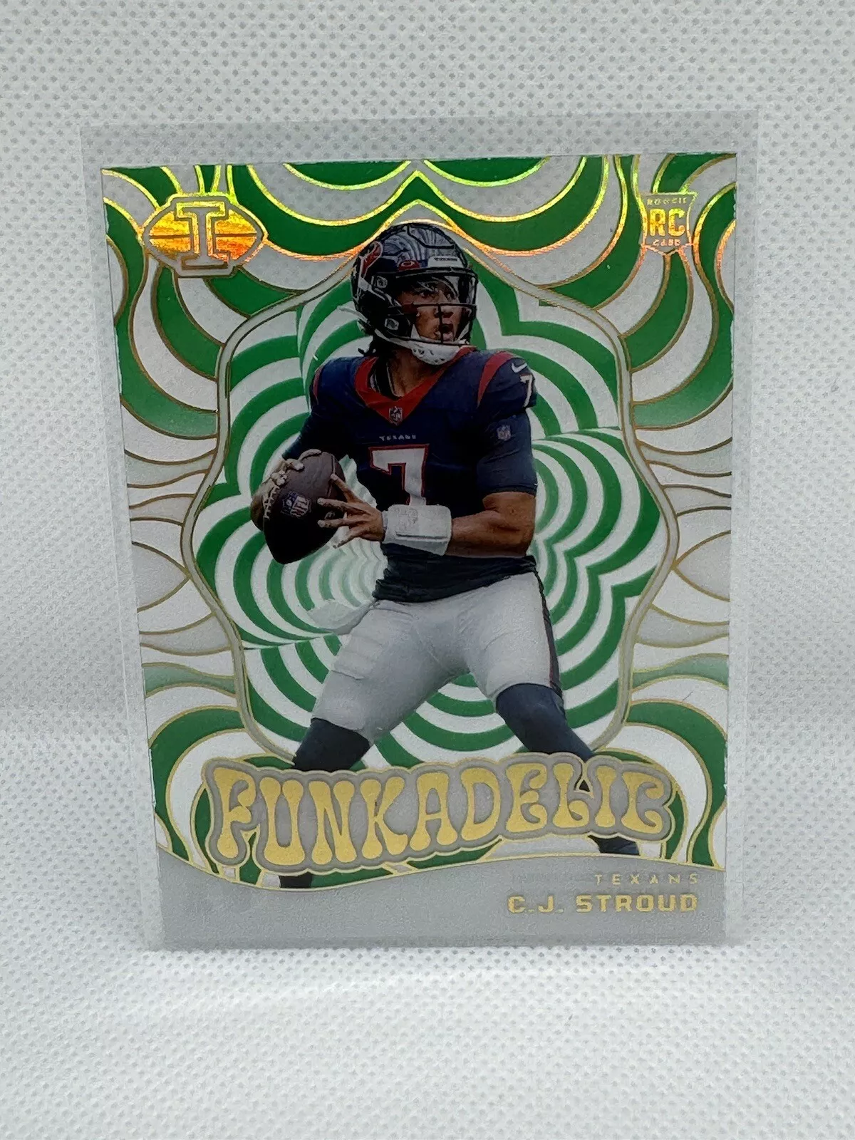2023 Panini Illusions - Funkadelic Green C.J. Stroud #14 RC #’d/10 Texans