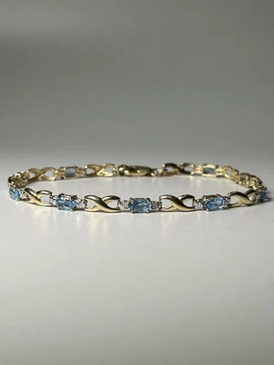 "Brazalete de tenis de oro amarillo sólido de 14K y topacio azul natural y diamantes naturales, 7""" Foto 1 de 4