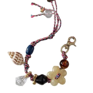 Nature Inspired Beadwork Conch Flower Charm Wearable Accessory - Picture 1 of 8