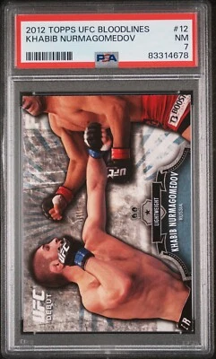 2012 TOPPS UFC BLOODLINES KHABIB NURMAGOMEDOV #12 RC ROOKIE DEBUT PSA 7 - Image 1 of 2