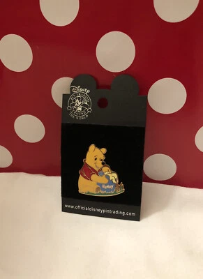 New! 2004 Disney Collectible Winnie the Pooh Eating From Honey Pot Trading Pin - Image 1 of 4