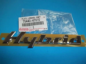 GENUINE TOYOTA PRIUS (2001-2003) LUGGAGE COMPT PLATE "HYBRID" 75443-47010 - Picture 1 of 1