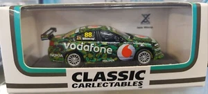 1:64 Jamie Whincup Holden VE Commodore Vodafone #88 T8 Camouflage TVL400 - Bild 1 von 1