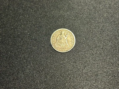 Media moneda de diez centavos de plata libertad sentada 1859-O buen estado Foto 1 de 2