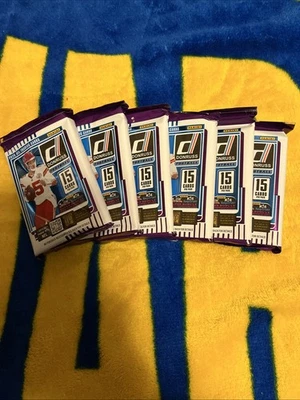 6 paquetes Donruss NFL 2025. 15 tarjetas cada una. Precintado. Fresco. Envío rápido. Nuevo. Foto 1 de 4