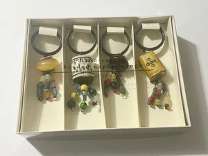 Vintage Pier 1 Hand Carved Napkin Rings Beaded Wooden Tribal Global Boho Y2K - Picture 1 of 8