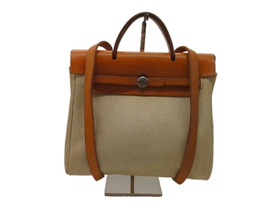 Auténtica mochila publicitaria JC6 Hermes Her Bag □E grabada herrajes plateados de Japón Foto 1 de 4