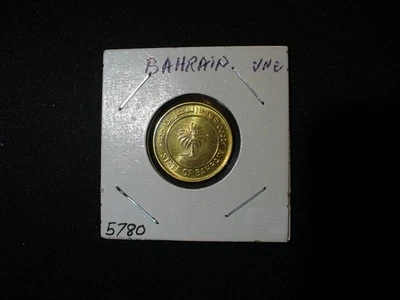 Не бывшая в обращении латунная монета Бахрейна 10 филсов - Изображение 1 из 2