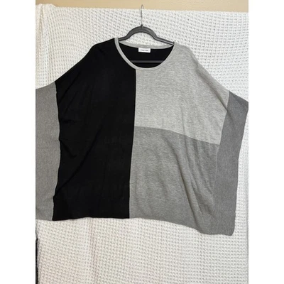 Poncho suéter de gran tamaño para mujer Calvin Klein Colorblock Foto 1 de 4
