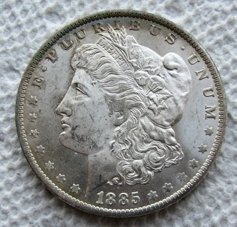 1885-O Morgan Silver Dollar New Orleans Uncirculated With Rainbow Toned Reverse Cover