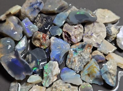 Paquete Lightning Ridge ópalo áspero y frotado azul púrpura lapidario 151,9 quilates australiano Foto 1 de 4